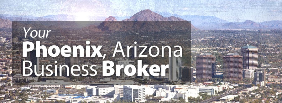 phoenix-az-businesses-district-in-sight-behind-banner-advertising-the-services-of-a-business-broker